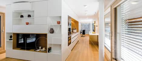 Penthouse | Living area | Flat-screen TV, heated floors