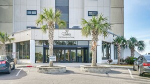 A modern building with a sign reading "The Renaissance Tower." - Pool & Ocean View: Myrtle Beach Resort Condo! (Myrtle Beach)