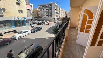 Departamento Confort, balcón, vista a la ciudad | Terraza o patio