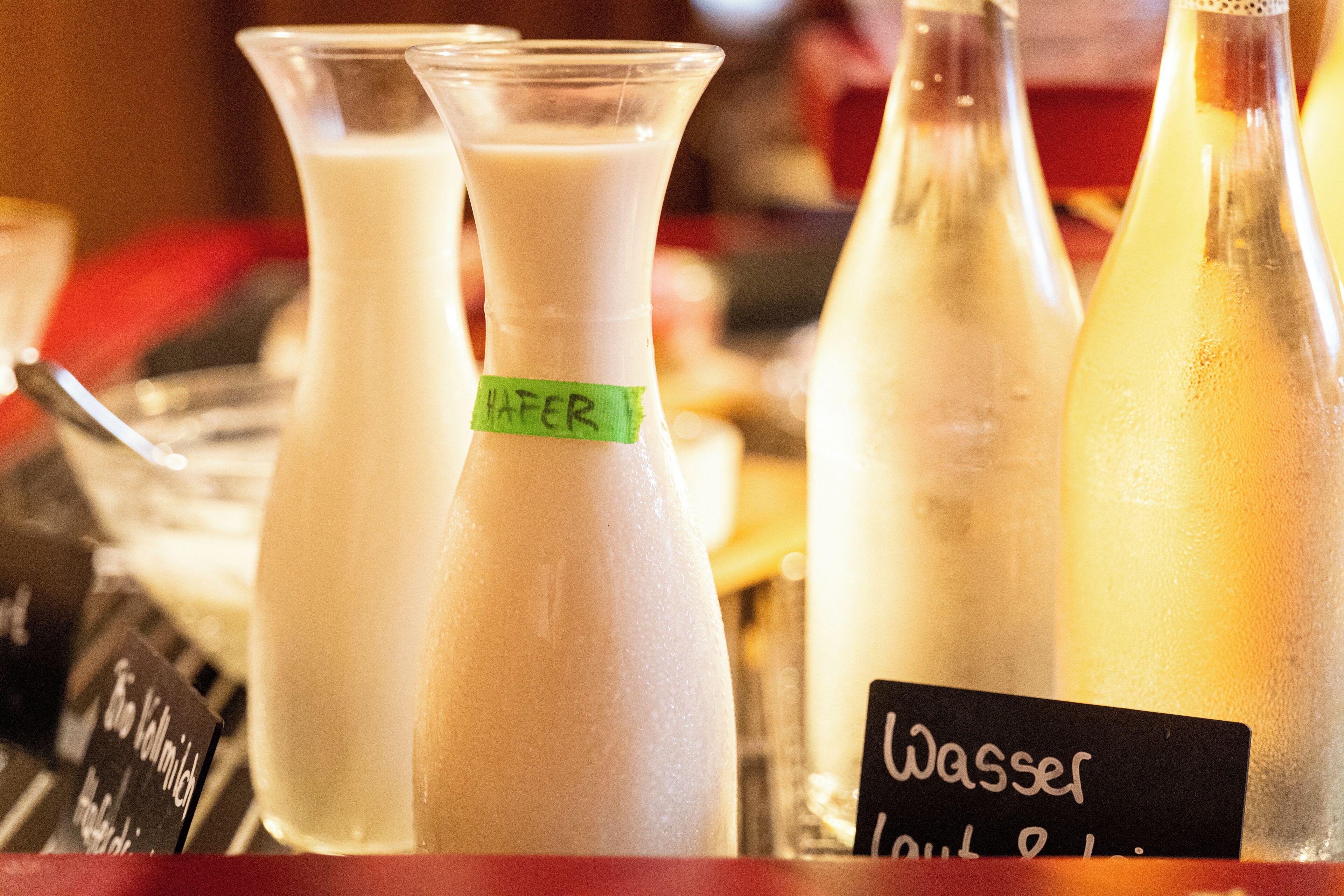 Bottles of beverages with labels, including one marked 'WAFER.'