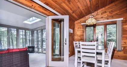 Scenic lakeside home on Three Lakes Chain with enclosed porch, dock, fire pit!
