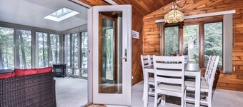Scenic lakeside home on Three Lakes Chain with enclosed porch, dock, fire pit!