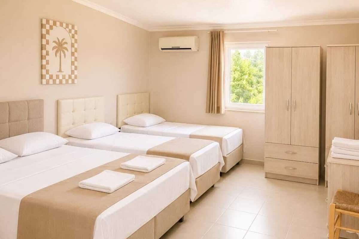 Chambre Quadruple Familiale, 1 chambre | Wi-Fi gratuit, draps fournis