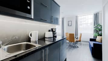 Superior Studio, Private Bathroom, City View | Hypo-allergenic bedding, blackout drapes, iron/ironing board, free WiFi