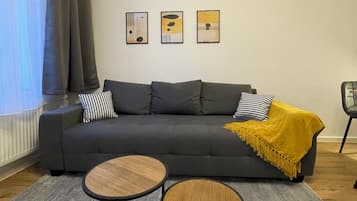 Design Apartment, Non Smoking, Kitchen | Living area | 43-inch Smart TV with cable channels