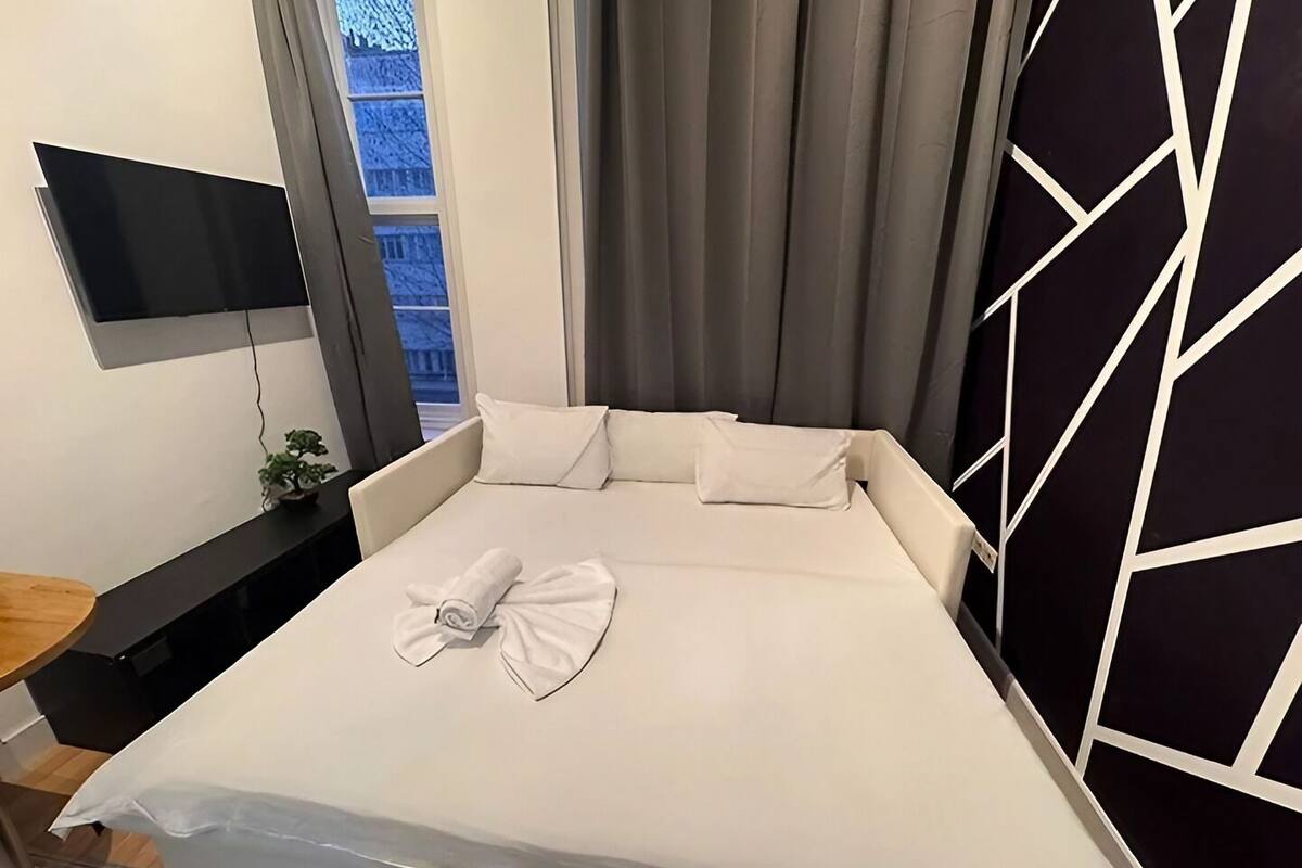 Blackout drapes, iron/ironing board, WiFi (free)