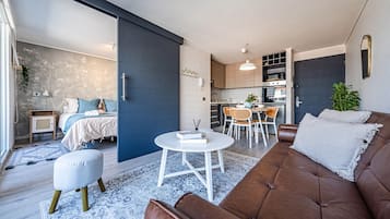 Superior Triple Room, 1 Bedroom, Balcony, City View | Living area | 43-inch Smart TV with digital channels