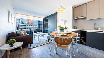 Superior Triple Room, 1 Bedroom, Balcony, City View | Dining