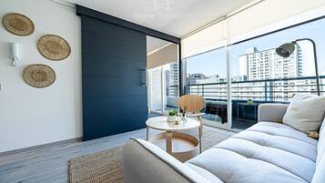 Apartment, 1 Bedroom, Balcony | Living area | 43-inch Smart TV with digital channels