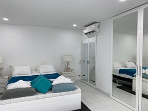 1 quarto, cofres nos quartos, ferros/tábuas de passar roupa