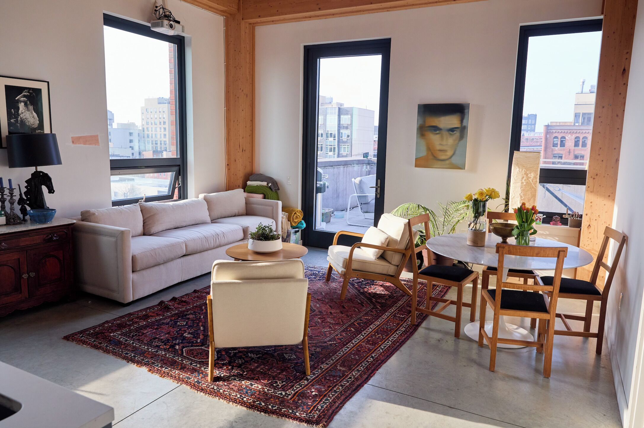 Charming industrial apartment near Domino Park with giant terrace. 
