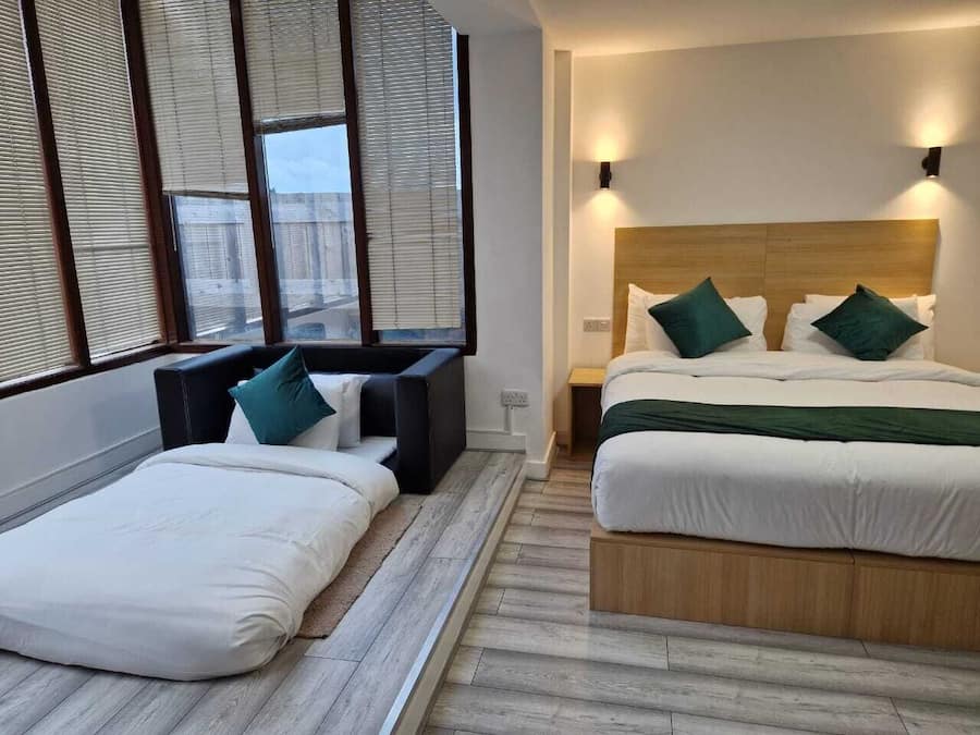 Family Room | Desk, laptop workspace, iron/ironing board, free WiFi