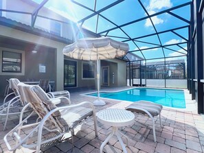 A heated pool - Beautiful 7 Bed Pool Home with Game Room-9117ECL (Champions Gate)