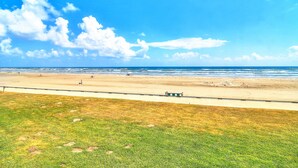A beach with a clear sky and ocean. - Gulfstream Condos Unit 208 | Pool & Hot Tub | Private Balcony, Panoramic View (Corpus Christi)