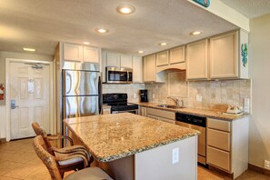 Fridge, microwave, oven, stovetop - Gulfstream Condos Unit 217 | Gulf-Front View with Beach Balcony & Pool (Corpus Christi)