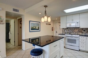 Fridge, microwave, oven, stovetop - Gulfstream Condos Unit 219 | Heated Pool & Hot Tub | Gulf View (Corpus Christi)