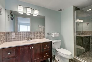 Shower, hair dryer, towels