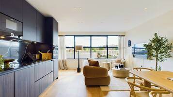 Premium Apartment, 3 Bedrooms, Balcony, Canal View | Living area | 45-inch Smart TV with digital channels, Netflix, streaming services