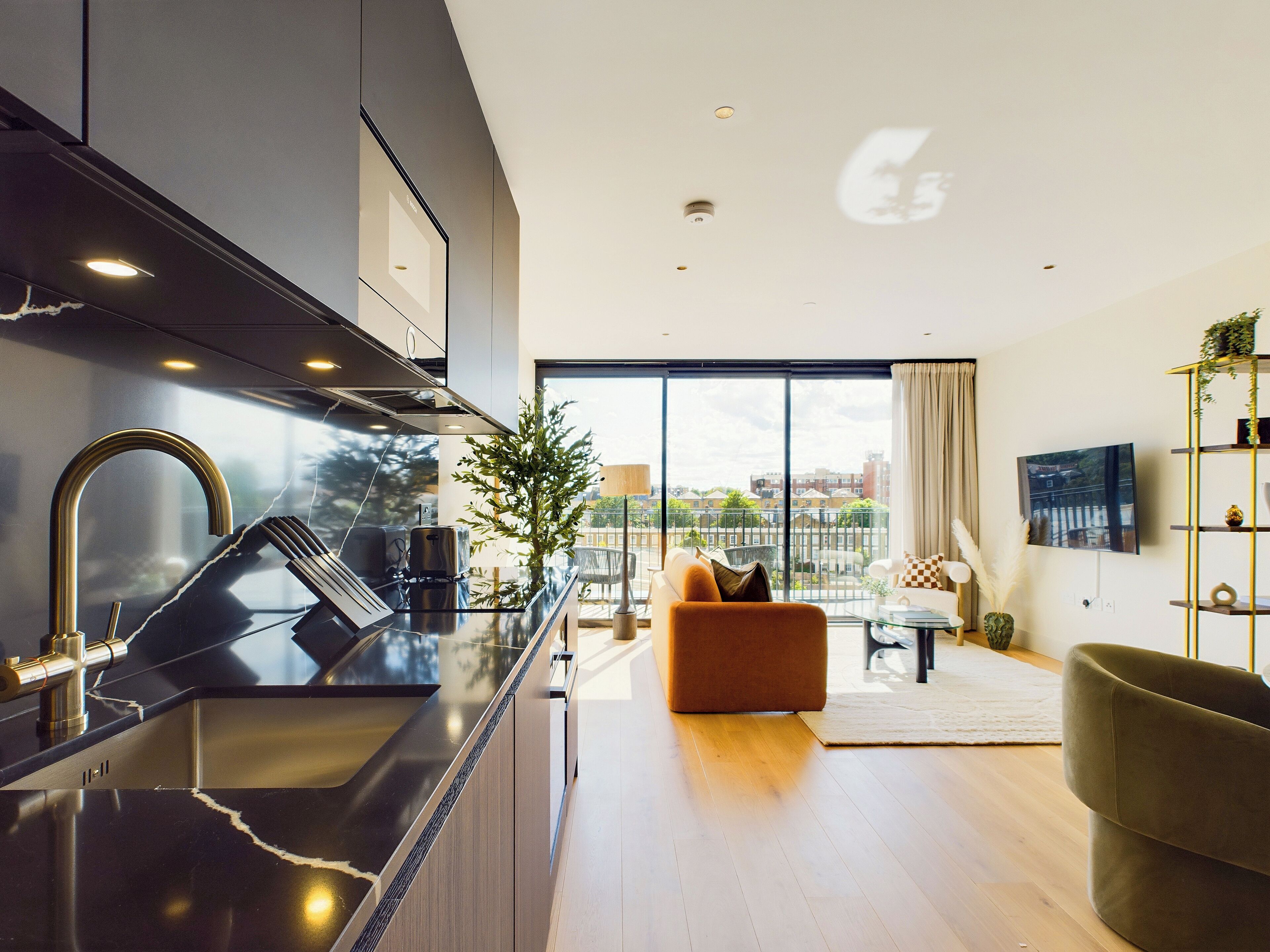 Deluxe Apartment, 2 Bedrooms, Balcony, City View | Private kitchen | Full-sized fridge, microwave, oven, stovetop