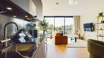 Comfort Penthouse, 2 Bedrooms, Balcony | Private kitchen | Full-sized fridge, microwave, oven, stovetop