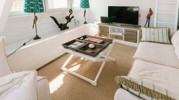 Superior House, Lake View | Living area | Flat-screen TV