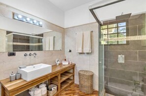 Shower, hair dryer, towels, soap