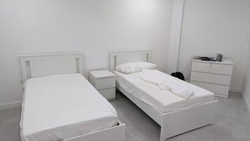 2 bedrooms, travel crib, WiFi, bed sheets