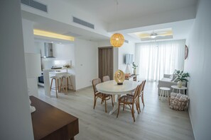Deluxe Apartment, 2 Bedrooms, Balcony, Pool View | Dining room