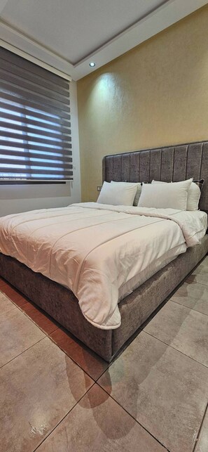 2 chambres, fer et planche à repasser, Wi-Fi, draps fournis