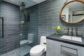 Shower, hair dryer, towels, soap