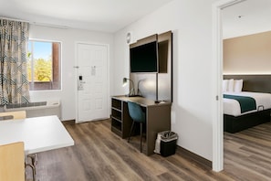Desk, laptop workspace, blackout curtains, free WiFi