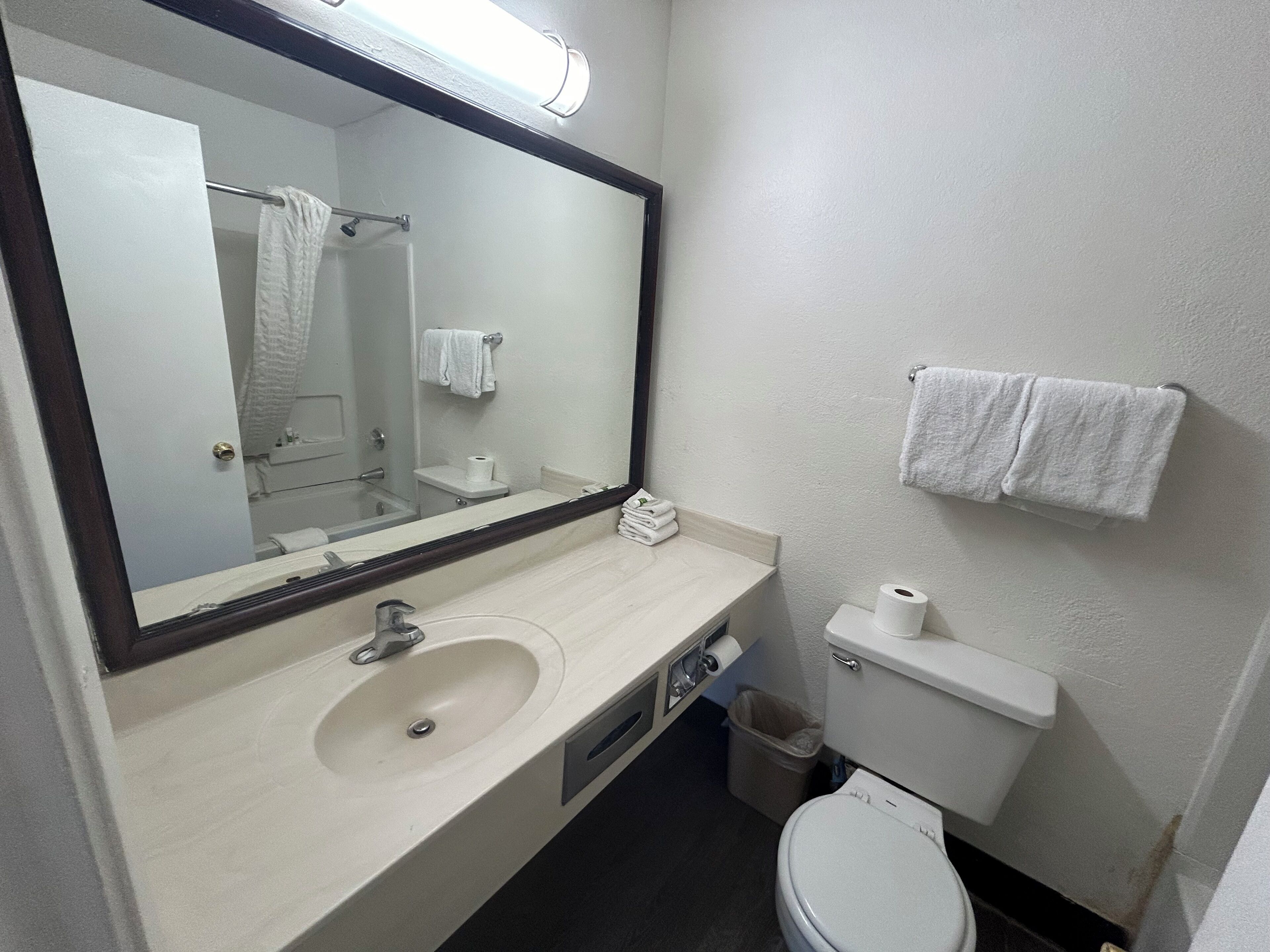 Combined shower/tub, towels, soap, toilet paper