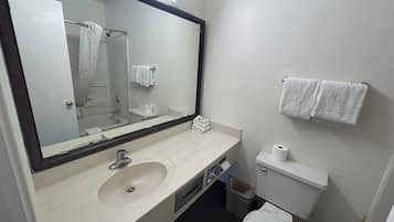 Combined shower/tub, towels, soap, toilet paper