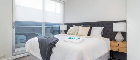 2 bedrooms, desk, iron/ironing board, travel crib