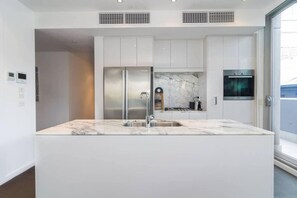 Fridge, microwave, oven, stovetop - Marble CBD Luxury 2 Bedroom Apt Pool & Parking (Adelaide)