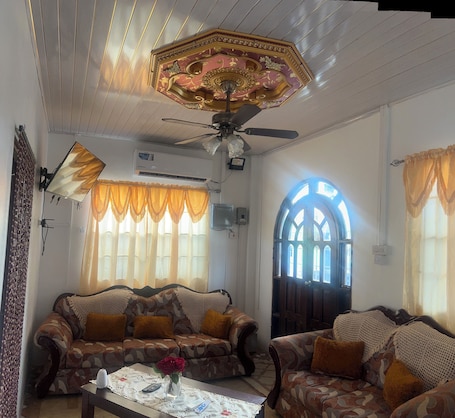 Cottage | Living area | 43-inch Smart TV with cable channels, pay movies. Lania Cottage