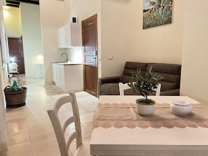 Standard Apartment, 1 Double Bed with Sofa bed, Kitchenette, Partial Sea View | Living area | TV