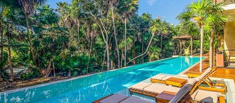 Beachfront apt on the beach with community pools, kitchenette, AC, hammock