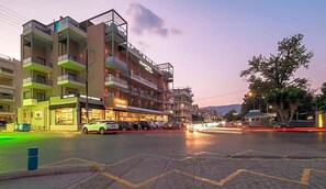 A multi-story building with balconies and a storefront. - Elektra Hotel & Spa (Kalamata)