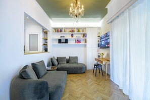 Deluxe Apartment, Balcony, City View | Living area | 40-inch Smart TV with digital channels, Netflix, streaming services