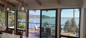 Summer Daze -   enjoy in/outdoor living in this new ocean front designer home. 