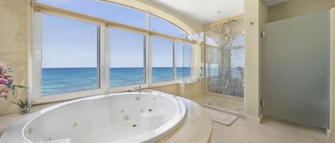 Shower, jetted tub, towels