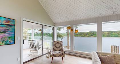 Waterfront home with hot tub, deck pool table and firepit