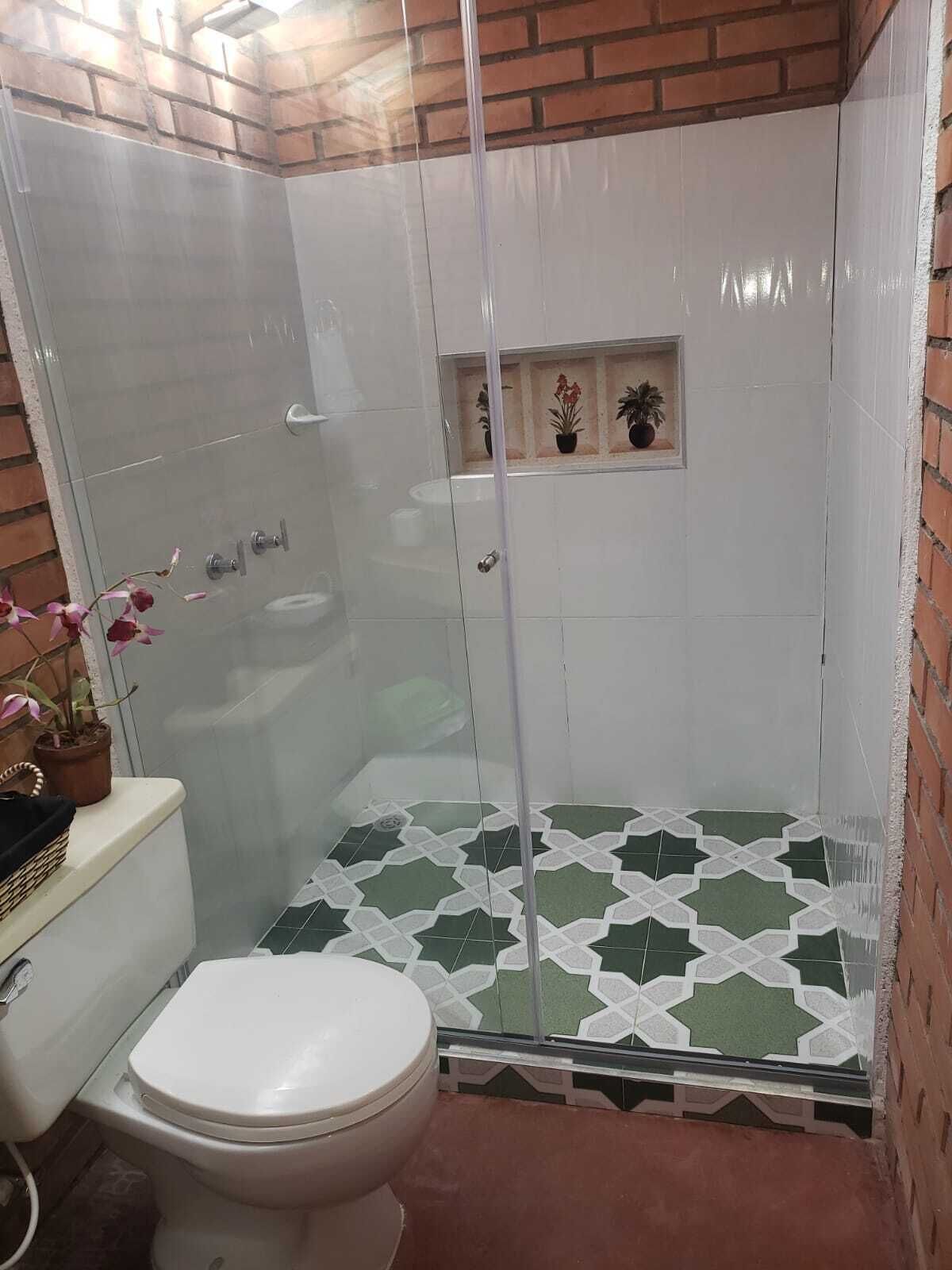 Classic Double Room, Garden View | Bathroom | Rainfall showerhead, towels, soap, shampoo