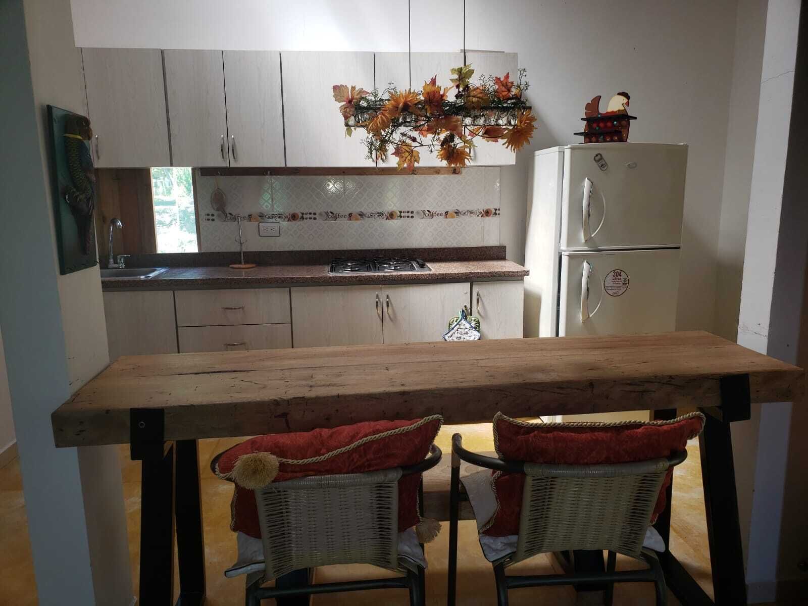 Family Studio Suite, 1 Bedroom, Pool View | Private kitchen | Full-size fridge, cookware/dishes/utensils