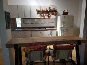 Family Studio Suite, 1 Bedroom, Pool View | Private kitchen | Full-size fridge, cookware/dishes/utensils - Hotel Villa Nico Bochalema  (Bochalema)