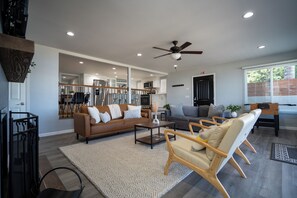 Smart TV, fireplace, foosball