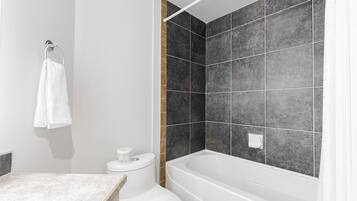 Hair dryer, towels, soap, shampoo