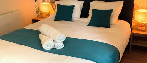 1 bedroom, desk, iron/ironing board, travel crib