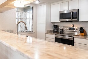 Fridge, microwave, oven, stovetop - Cozy condo with tennis courts, pool, and close to the Rivers and Schlitterbahn. (New Braunfels)